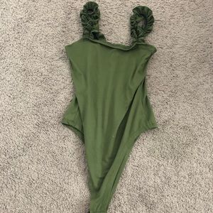 green bodysuit